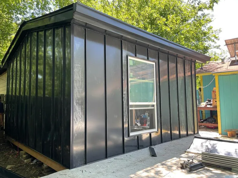 Black standing seam metal wall panels for Roof Inspection in Brookshire