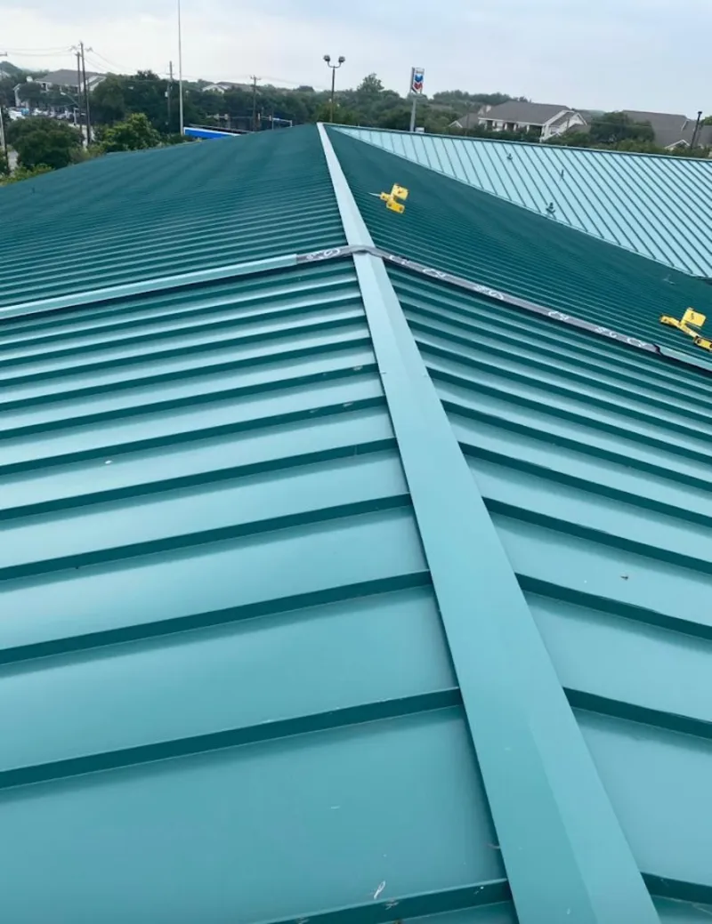 Green commercial metal roof ridge and valley for Metal Roof Repair in Brookshire