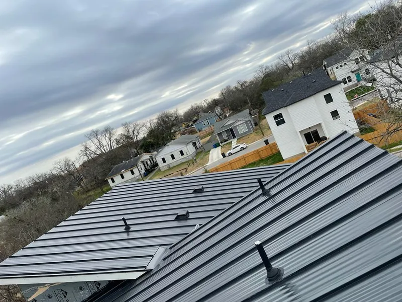 Standing seam metal roof panels with vents for Skylight Repair in Brookshire